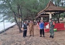 Koramil 12/Dasuk Laksanakan Pengamanan Tempat Wisata Pantai Slopeng
