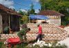 Program RTLH Milik Sunariyah di Kecamatan Batu Putih, Sertu Moh Nahrowi Kebut Pemasangan Batu Dinding